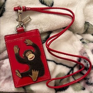 Coach Red Card Holder with Monkey Design